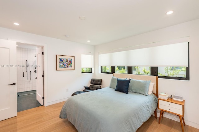 8959 Abbott Ave, Surfside, FL 33154 - bedroom featuring light wood-style flooring, recessed lighting, and baseboards