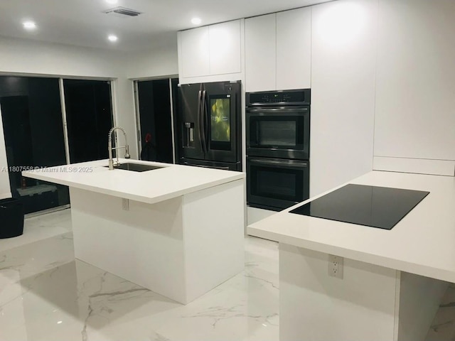 22125 SW 97th Ct, Cutler Bay, FL 33190 - kitchen featuring black appliances, a sink, modern cabinets, white cabinets, and recessed lighting