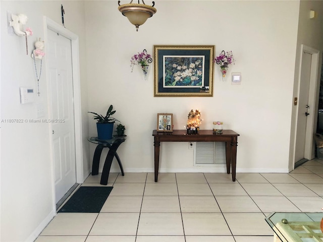 21468 SW 88th Ave, Cutler Bay, FL 33189 - foyer with light tile patterned floors and baseboards