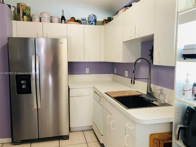 21468 SW 88th Ave, Cutler Bay, FL 33189 - kitchen featuring stainless steel refrigerator with ice dispenser, a sink, light countertops, and white dishwasher