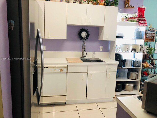 21468 SW 88th Ave, Cutler Bay, FL 33189 - kitchen featuring dishwasher, stainless steel refrigerator with ice dispenser, light countertops, light tile patterned flooring, and white cabinets