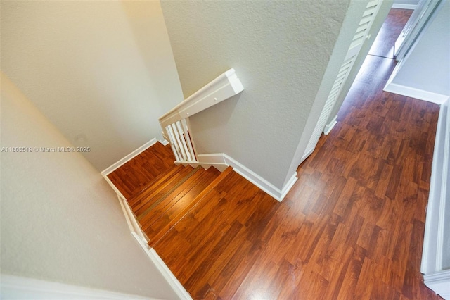 1880 SE 3rd Dr, Homestead, FL 33033 - staircase featuring wood finished floors and baseboards