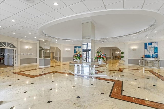 3800 S Ocean Dr Unit 1810, Hollywood, FL 33019 - community lobby with recessed lighting, ornamental molding, and a wainscoted wall