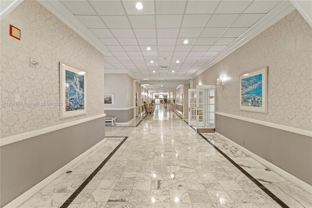 3800 S Ocean Dr Unit 1810, Hollywood, FL 33019 - hallway with crown molding, wainscoting, french doors, recessed lighting, and marble finish floors