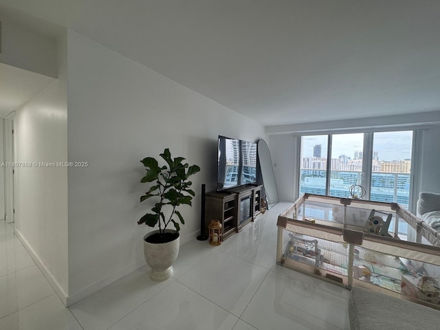 3800 S Ocean Dr Unit 1810, Hollywood, FL 33019 - tiled living room with baseboards