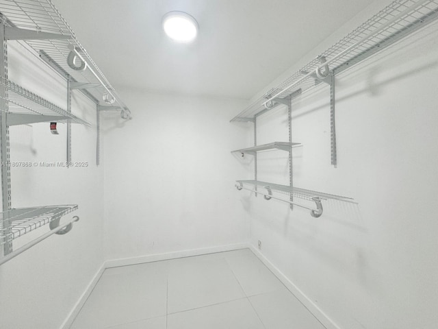 3800 S Ocean Dr Unit 1810, Hollywood, FL 33019 - walk in closet featuring tile patterned flooring
