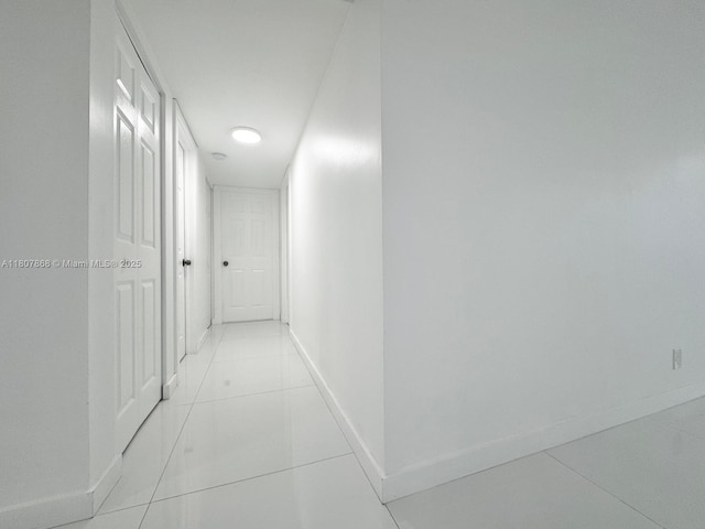3800 S Ocean Dr Unit 1810, Hollywood, FL 33019 - corridor with baseboards and light tile patterned flooring