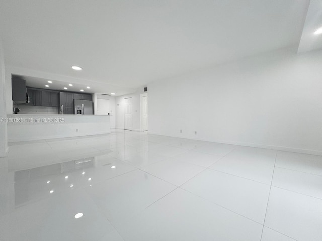 3800 S Ocean Dr Unit 1810, Hollywood, FL 33019 - unfurnished living room with recessed lighting and light tile patterned flooring