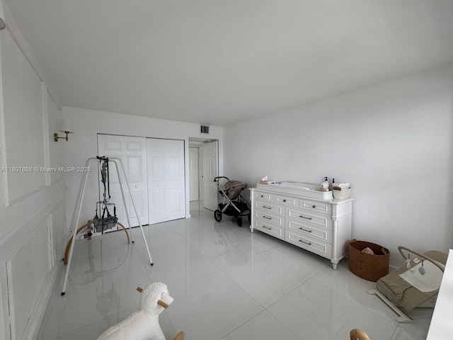 3800 S Ocean Dr Unit 1810, Hollywood, FL 33019 - bedroom featuring light tile patterned floors and a closet
