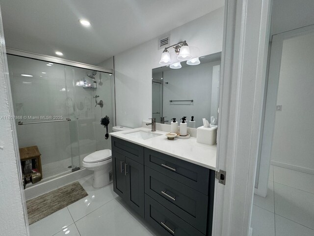 3800 S Ocean Dr Unit 1810, Hollywood, FL 33019 - bathroom with vanity, toilet, a shower stall, and recessed lighting