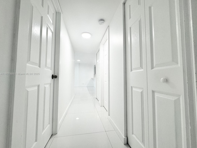 3800 S Ocean Dr Unit 1810, Hollywood, FL 33019 - hall with light tile patterned flooring and baseboards