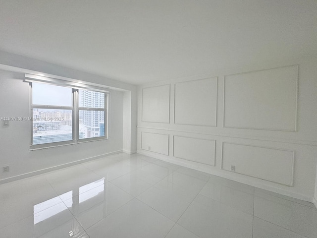 3800 S Ocean Dr Unit 1810, Hollywood, FL 33019 - unfurnished room featuring light tile patterned flooring and baseboards