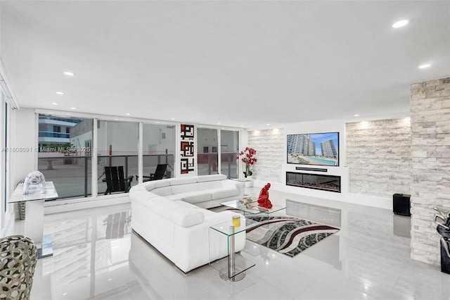 2751 S Ocean Dr Unit 301S, Hollywood, FL 33019 - living room featuring recessed lighting, tile patterned floors, and a glass covered fireplace