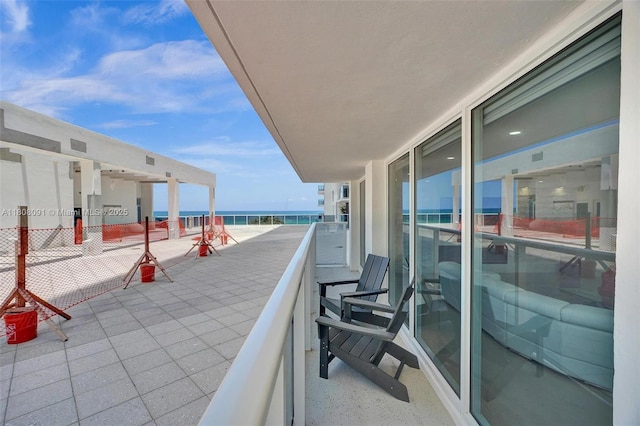 2751 S Ocean Dr Unit 301S, Hollywood, FL 33019 - balcony with view of water and beach and a sunroom