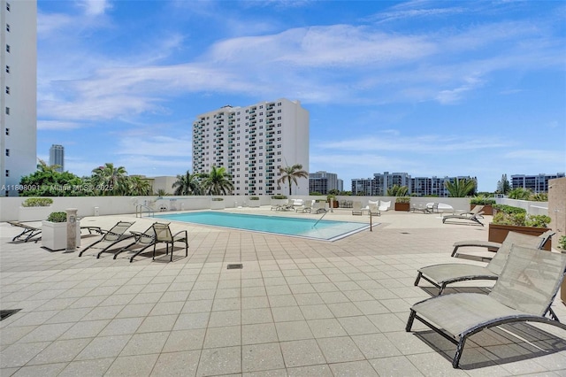 2751 S Ocean Dr Unit 301S, Hollywood, FL 33019 - community pool featuring a patio area and a view of city