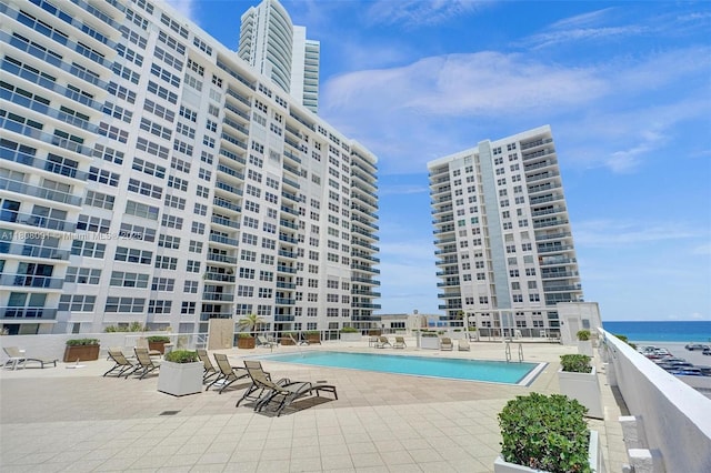 2751 S Ocean Dr Unit 301S, Hollywood, FL 33019 - community pool featuring a patio and a water view