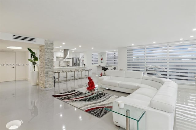 2751 S Ocean Dr Unit 301S, Hollywood, FL 33019 - tiled living area featuring ornate columns and recessed lighting