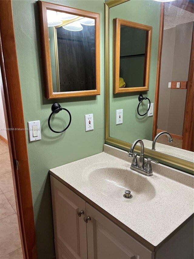 8004 SW 149th Ave Unit C102, Miami, FL 33193 - bathroom with vanity and tile patterned flooring