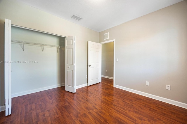 1985 SE 3rd St, Homestead, FL 33033 - unfurnished bedroom featuring wood finished floors, a closet, and baseboards