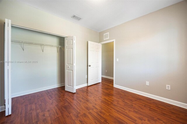 1985 SE 3rd St, Homestead, FL 33033 - unfurnished bedroom featuring wood finished floors, a closet, and baseboards