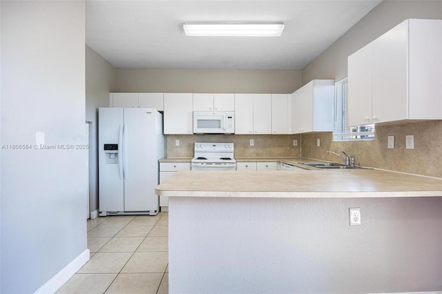 1985 SE 3rd St, Homestead, FL 33033 - kitchen with white appliances, a sink, light countertops, a peninsula, and tasteful backsplash