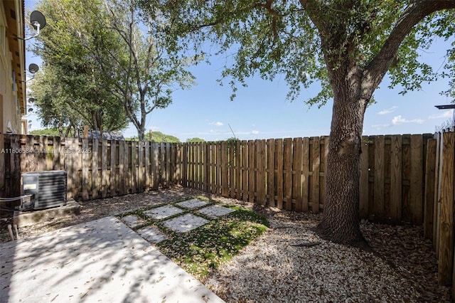 1985 SE 3rd St, Homestead, FL 33033 - fenced backyard featuring a patio area and central AC