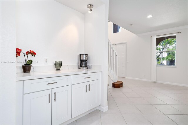 850 Nandina Dr, Weston, FL 33327 - bar featuring baseboards, light tile patterned flooring, stairs, and recessed lighting