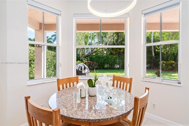 850 Nandina Dr, Weston, FL 33327 - dining room featuring baseboards, plenty of natural light, and tile patterned floors