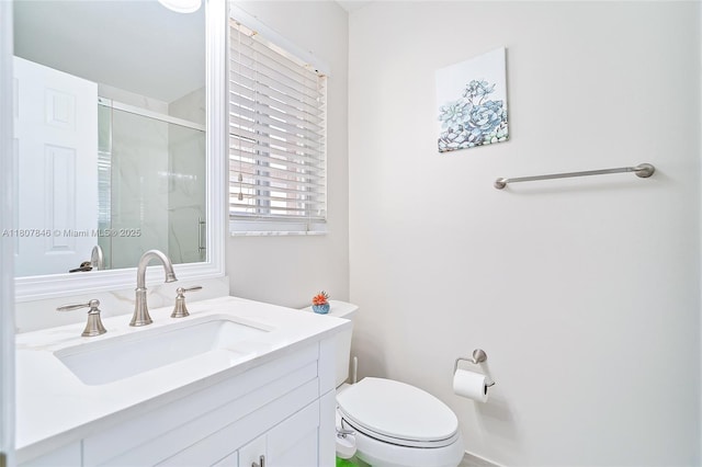 850 Nandina Dr, Weston, FL 33327 - full bathroom featuring vanity, a stall shower, and toilet