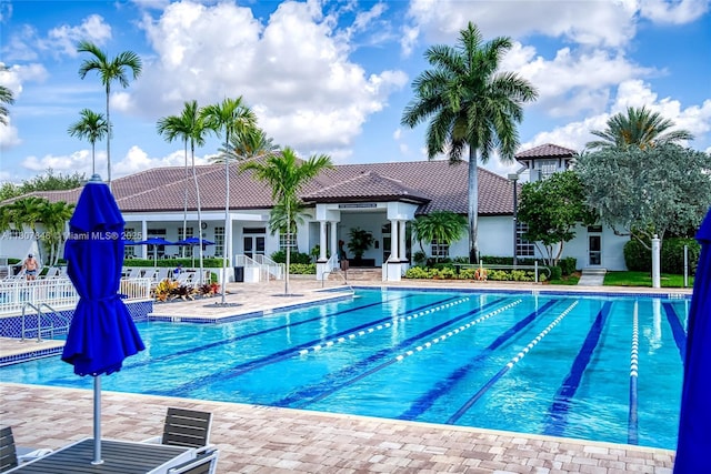 850 Nandina Dr, Weston, FL 33327 - community pool featuring a patio area