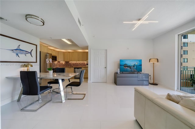 3500 Coral Way Unit 604, Miami, FL 33145 - dining space featuring light tile patterned flooring and baseboards