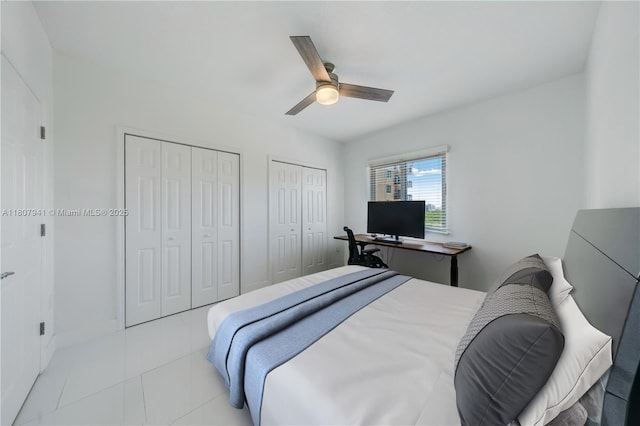3500 Coral Way Unit 604, Miami, FL 33145 - tiled bedroom with two closets and ceiling fan