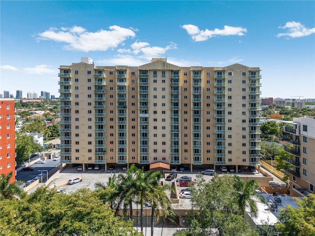 3500 Coral Way Unit 604, Miami, FL 33145 - view of apartment building / complex with uncovered parking and a view of city