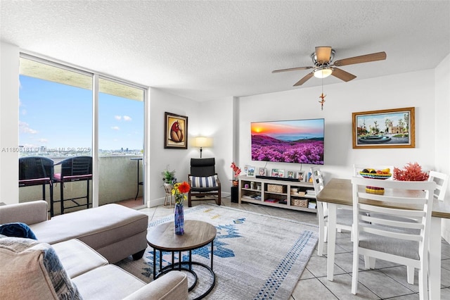 3000 Coral Way Unit 1505, Miami, FL 33145 - living area featuring ceiling fan, a textured ceiling, and tile patterned floors