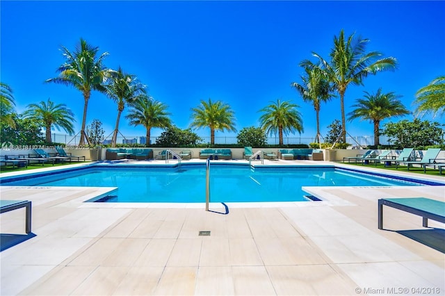 3000 Coral Way Unit 1505, Miami, FL 33145 - community pool with outdoor lounge area and a patio