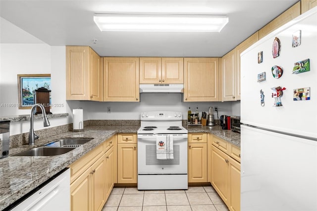 3000 Coral Way Unit 1505, Miami, FL 33145 - kitchen featuring white appliances, under cabinet range hood, light brown cabinetry, a sink, and light tile patterned floors