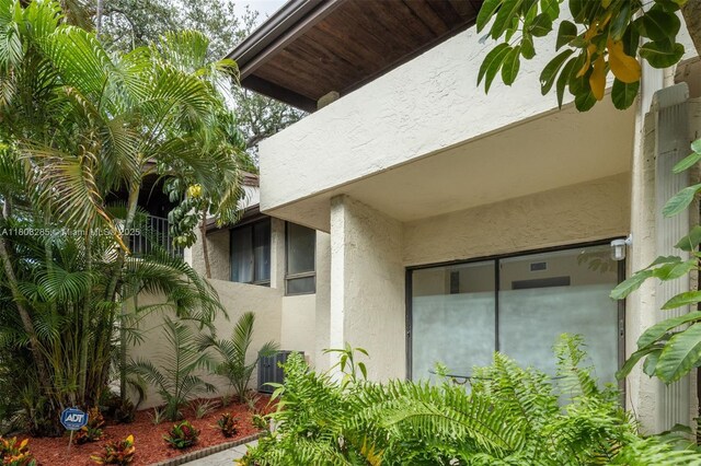 19460 NE 26th Ave Unit 12B, Miami, FL 33180 - view of home's exterior featuring stucco siding