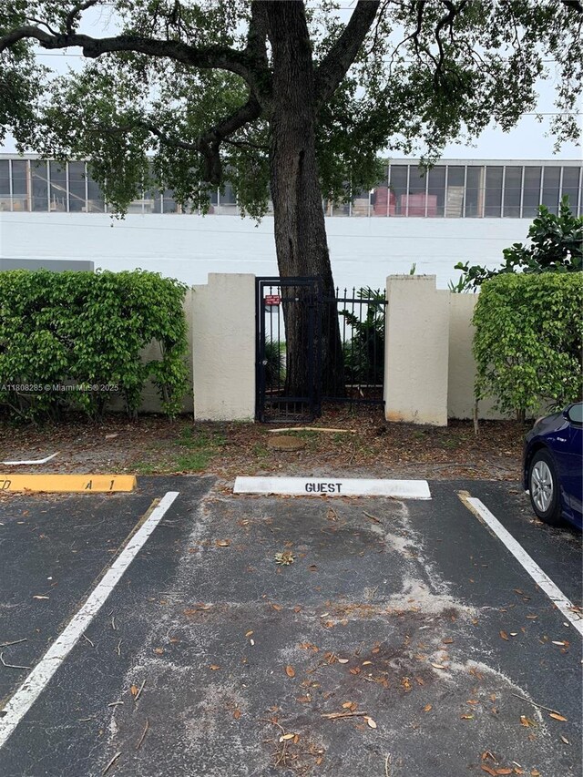 19460 NE 26th Ave Unit 12B, Miami, FL 33180 - view of uncovered parking lot