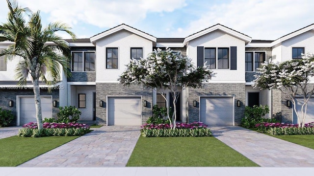 141 NE 13th Ter, Homestead, FL 33033 - view of front of property with a garage, stone siding, driveway, and stucco siding
