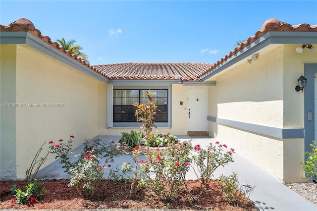 11186 NW 21st St, Coral Springs, FL 33071 - property entrance featuring stucco siding and a tile roof