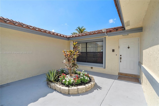 11186 NW 21st St, Coral Springs, FL 33071 - view of exterior entry with stucco siding