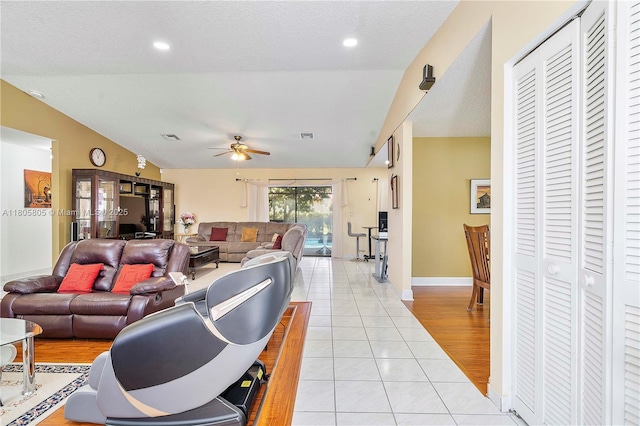 11186 NW 21st St, Coral Springs, FL 33071 - living room featuring lofted ceiling, light tile patterned floors, a ceiling fan, baseboards, and recessed lighting