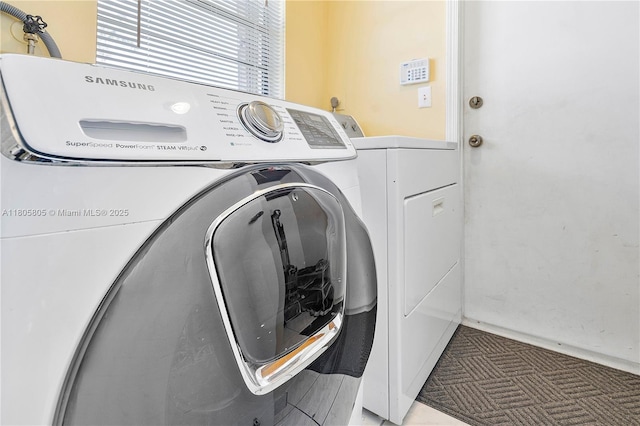 11186 NW 21st St, Coral Springs, FL 33071 - laundry area featuring washer and clothes dryer