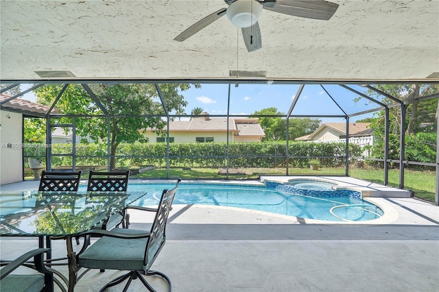 11186 NW 21st St, Coral Springs, FL 33071 - view of swimming pool with glass enclosure, a patio area, and a ceiling fan