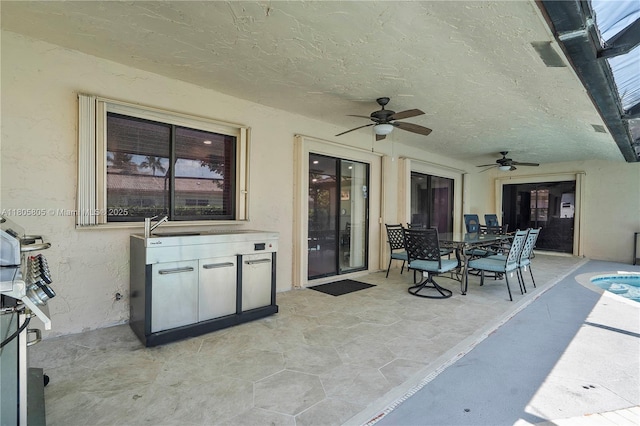 11186 NW 21st St, Coral Springs, FL 33071 - view of patio with ceiling fan, outdoor dining area, and exterior kitchen