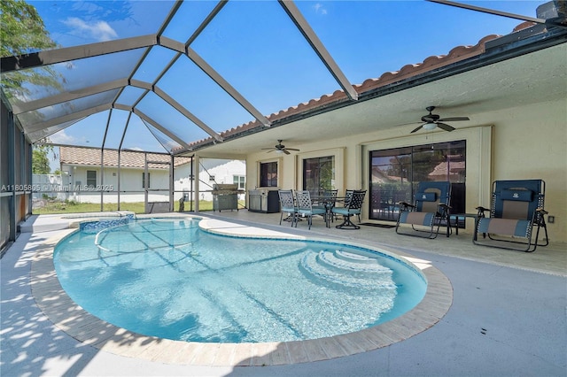 11186 NW 21st St, Coral Springs, FL 33071 - view of swimming pool featuring a ceiling fan, a patio, a pool with connected hot tub, and glass enclosure