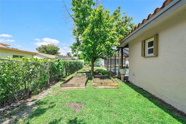 11186 NW 21st St, Coral Springs, FL 33071 - view of yard with a vegetable garden