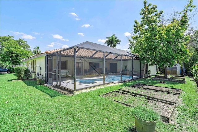 11186 NW 21st St, Coral Springs, FL 33071 - back of house with an outdoor pool, a yard, stucco siding, and a patio