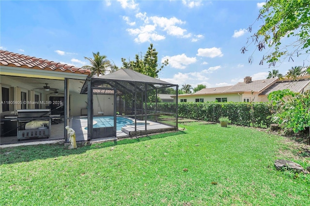 11186 NW 21st St, Coral Springs, FL 33071 - view of yard with a ceiling fan, a patio, glass enclosure, and a hot tub