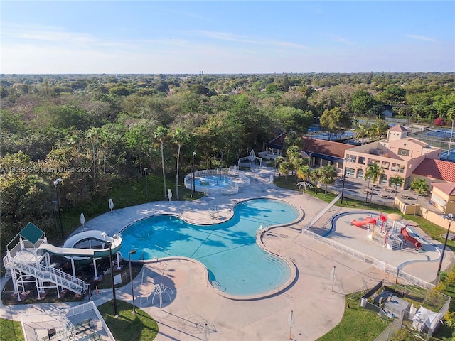 11186 NW 21st St, Coral Springs, FL 33071 - community pool with a forest view and a patio
